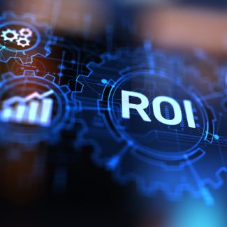 ROI Return on investment reading revenue business concept on virtual screen.